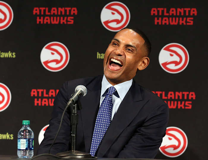 Atlanta Hawks owner Grant Hill speaks during a press conference at Philips Arena. The Atlanta Hawks officially announced today that it was purchased by an ownership group led by Tony Ressler, which Hill is a part of.